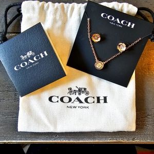 Brand new with tags, COACH Rose gold/Rhinestone flower studs and necklace set.
